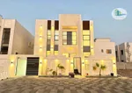 Villa for sale in Ajman, Al Helio area, two floors facing a stone directly on a neighbor street, with the possibility of easy bank financing : Image 1