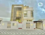 Villa for sale in Ajman, Al-Zahia area, two floors with a central air conditioning stone directly on a neighbor street, with the possibility of easy bank financing : Image 1