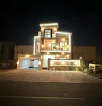 Villa for sale in Ajman, Jasmine area, with two floors and a roof facing a central air conditioning stone with the machine directly on a neighbor street with the possibility of bank financing : Image 1