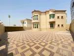 Two storey villa for rent in Ajman, Al Raqayib area
5 rooms, a majlis and a hall 
and maid's room 
With air conditioners
The house is large and has an indoor umbrella 
An area of 10 thousand feet 
Only 85000 two batches are required : Image 2