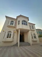 For sale a villa in the Emirate of Sharjah, Al-Suyoh area, consisting of 4 master bedrooms, a hall, a majlis with a dining room and an external extension : Image 1