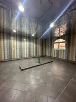 For sale a villa in the Emirate of Sharjah, Al-Suyoh area, consisting of 4 master bedrooms, a hall, a majlis with a dining room and an external extension : Image 8