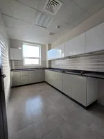 For annual rent, a two-bedroom apartment with a hall, a master bedroom, and two bathrooms in Ajman, Al Jurf area, close to the National School : Image 7