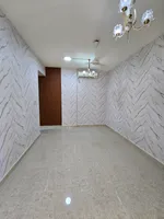 Two bedroom apartment and balcony hall for annual rent in Ajman, Al Rawdha 3 area : Image 2