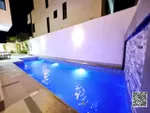 With electricity, water and air conditioners, two floors, a roof and a swimming pool with a stone face : Image 3