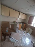 شقه  غرفة وصاله ومطبخ وحمام وبلكونه وخزانه بالحائط تكييف مركزي مساحه واسعه العنوان الراشيديه قريب من  شارع المرور علي محمد بن زايد مباشر  مخرج دبي والشارقه//Apartment with one bedroom, a living room, a kitchen, a bathroom, a balcony, a built-in wardr : Image 6