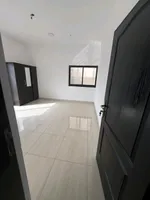 Two bedroom apartment with two bathrooms and balcony for annual rent in Al-Bostan area in front of the city police station : Image 5