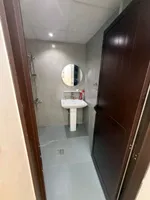 Two bedroom apartment with two bathrooms and balcony for annual rent in Al-Bostan area in front of the city police station : Image 7