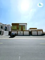 Villa for sale in Ajman, Al Rawdah area, two floors with a stone facade with an external extension, with the possibility of easy bank financing : Image 1