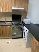 For rent in the Emirate of Ajman, Rashidiya area, City Tower Towers on Sheikh Khalifa Street, a very clean furnished room and hall with two bathrooms and a balcony. The price is 3400 without net : Image 7