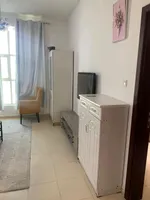 For rent in the Emirate of Ajman, Rashidiya area, City Tower Towers on Sheikh Khalifa Street, a very clean furnished room and hall with two bathrooms and a balcony. The price is 3400 without net : Image 2