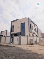 Villa for sale in Ajman, Al Helio area, with two floors facing a stone corner of two streets, with the possibility of easy bank financing : Image 1