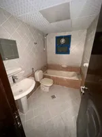 A room and a hall for annual rent in Ajman in Naimiya 2 on King Faisal Street : Image 7