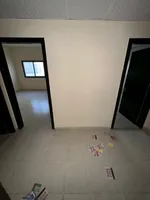 A room and a hall for annual rent in Ajman in Naimiya 2 on King Faisal Street : Image 5