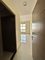 Two rooms and a hall with a large store in Rawdha 3 for annual rent in Ajman : Image 2