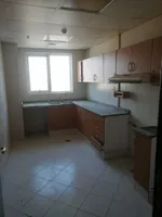 For rent, two rooms and a hall, Ajman Corniche, a large area, free air conditioning, free parking, close to all services, payment facilities in 4 or 6 payments : Image 2