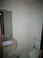 For rent, two rooms and a hall, Ajman Corniche, a large area, free air conditioning, free parking, close to all services, payment facilities in 4 or 6 payments : Image 3