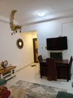For rent, a furnished apartment with a living room : Image 3