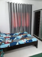 For rent, a furnished apartment with a living room : Image 4