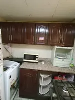 For rent, a furnished apartment with a living room : Image 7