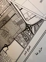 For sale, residential land in Muzaira'a Al-Rahmaniyah, a distinctive location on a street near government buildings and Al-Rahmaniyah Mall : Image 4