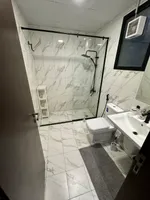 The Taawun room and hall is furnished for monthly rent with a balcony, a balcony, a gym and a swimming pool to book immediately : Image 4