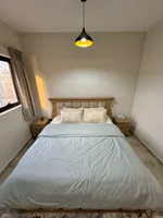 The Taawun room and hall is furnished for monthly rent with a balcony, a balcony, a gym and a swimming pool to book immediately : Image 7