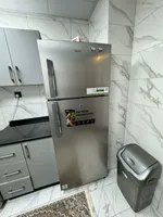 The Taawun room and hall is furnished for monthly rent with a balcony, a balcony, a gym and a swimming pool to book immediately : Image 6