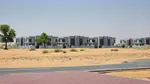 For sale residential investment plots of land (ground floor + 2) directly next to Umm Al Quwain University on Sheikh Mohammed bin Zayed Road : Image 1