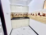 An apartment for rent in Mohammed Bin Zayed consists of a room, a hall and a bathroom : Image 6