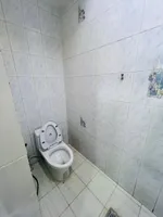 An apartment for rent in Mohammed Bin Zayed consists of a room, a hall and a bathroom : Image 3