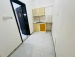 An apartment for rent in Mohammed Bin Zayed consists of a room, a hall and a bathroom : Image 4