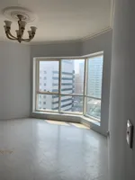 For rent, a room and a lounge with an open view, free air conditioning, a gym, and a free swimming pool in the Al Qasba area : Image 1