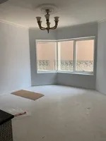 For rent, a room and a lounge with an open view, free air conditioning, a gym, and a free swimming pool in the Al Qasba area : Image 4