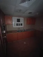 An office for rent in Ajman on Khalifa Street with an area of 1500 feet : Image 6