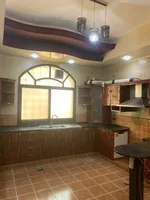 A house for rent in Ajman, Al Raqayib area, consists of 3 rooms, a majlis, a maid room and monsters. 65 thousand 4 payments are required : Image 2