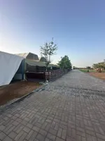 For sale a farm in Sharjah in the Zubair area (Shanouf) with an area of 100,000 square feet. It has a villa consisting of three master bedrooms, a large hall, and an external extension with a kitchen, a maid's room and a store. It has rooms for worke : Image 6