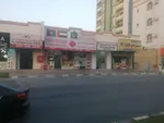 بناية محلات تجارية للبيع عجمان الراشدية 1 على شارع الشيخ راشد بن عبدالعزيز امام ابراج الفالكون زاوية على شارعين مساحة الارض 18222 الف قدم مربع  عدد المحلات 21 محل مواقف موقع مميز تملك حر جنب كل الخدمات السعر11 مليون : Image 4