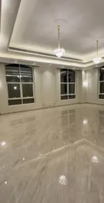 For sale, a new elegant villa in Sharjah, Al-Hoshi area, has a unique location adjacent to Al Nouf area, the first resident with a classic design. It consists of 5 master bedrooms with wardrobes, a hall, a majlis, a kitchen and a maid's room. Central : Image 4