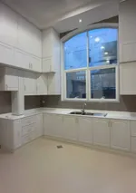 For sale, a new elegant villa in Sharjah, Al-Hoshi area, has a unique location adjacent to Al Nouf area, the first resident with a classic design. It consists of 5 master bedrooms with wardrobes, a hall, a majlis, a kitchen and a maid's room. Central : Image 7