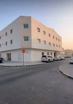 For sale, an elegant building in Sharjah, Maysaloon area. The land area is 6200 square feet on three two-year-old streets. It consists of 9 rooms, a hall, 4 rooms, a hall, 4 studios and 9 parking spaces. The current income is about 330 thousand dirha : Image 1