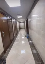 For sale, an elegant building in Sharjah, Maysaloon area. The land area is 6200 square feet on three two-year-old streets. It consists of 9 rooms, a hall, 4 rooms, a hall, 4 studios and 9 parking spaces. The current income is about 330 thousand dirha : Image 8