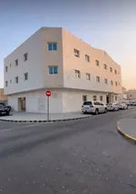 For sale, an elegant building in Sharjah, Maysaloon area. The land area is 6200 square feet on three two-year-old streets. It consists of 9 rooms, a hall, 4 rooms, a hall, 4 studios and 9 parking spaces. The current income is about 330 thousand dirha : Image 2