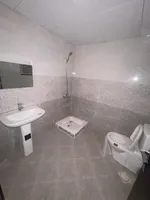Two rooms and a hall for annual rent for the first resident with a free month in Al Jerf 3, Ajman : Image 8