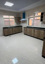 Villas for sale in Sharjah in the Rahmaniya suburb in Basateen Al Zubair. The villa consists of 6 master bedrooms, two halls, a majlis, a kitchen, a maid's room and an elevator in each villa : Image 6