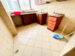 Apartments for annual rent in Al Ain, three rooms, a hall, a kitchen and three bathrooms : Image 5
