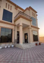 A new villa for sale in Sharjah, Al Hoshi area, consists of 5 master bedrooms, a hall, a majlis and a kitchen. There is an external extension with a kitchen, a maid's room, a laundry room, a pantry and an ironing room : Image 1