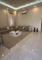 A new villa for sale in Sharjah, Al Hoshi area, consists of 5 master bedrooms, a hall, a majlis and a kitchen. There is an external extension with a kitchen, a maid's room, a laundry room, a pantry and an ironing room : Image 7