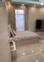 A new villa for sale in Sharjah, Al Hoshi area, consists of 5 master bedrooms, a hall, a majlis and a kitchen. There is an external extension with a kitchen, a maid's room, a laundry room, a pantry and an ironing room : Image 8