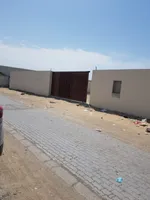 For rent, industrial land in Sharjah is located in Industrial Area (13) and consists of surrounded land : Image 1